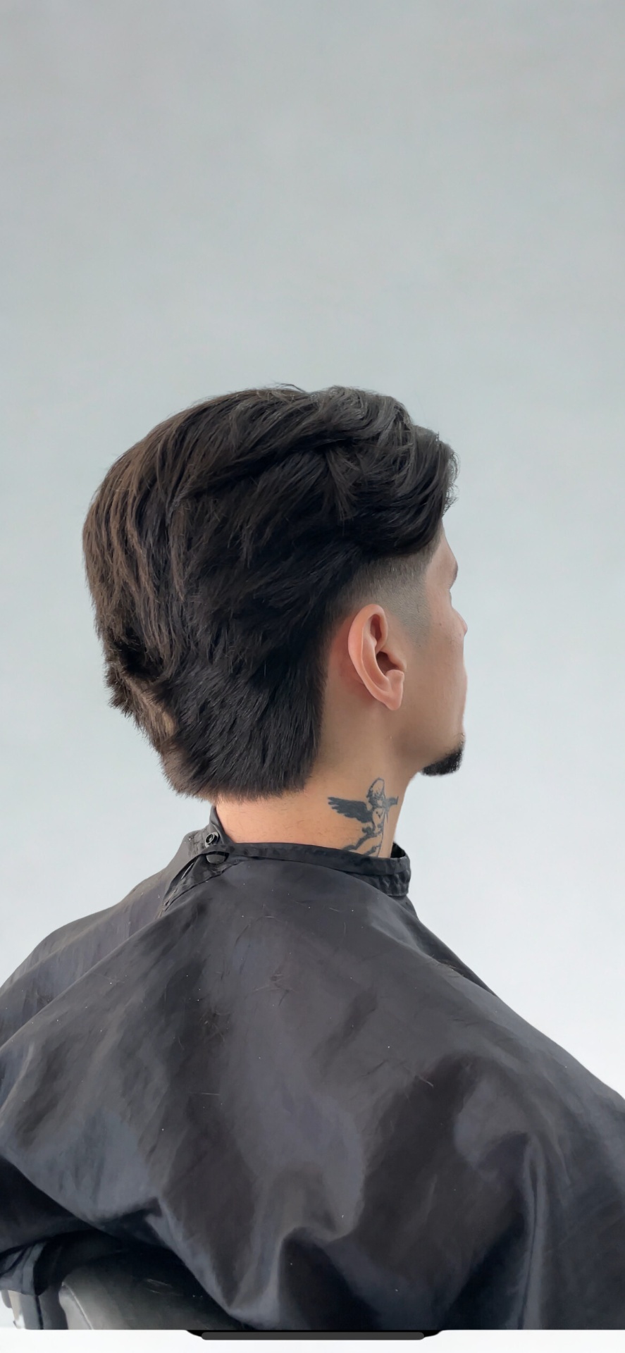 Mullet moderno com fade baixo